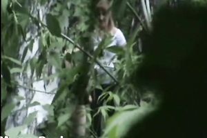 Blonde white Russian housewife in the high grass squats and piddles