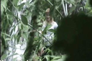 Blonde white Russian housewife in the high grass squats and piddles