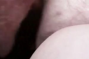 Mature neighbor plays with her cookie during the time that I film her on camera