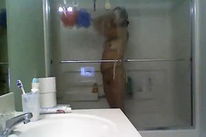My sunburned dark brown GF takes shower on hidden webcam