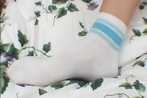 Hot and breasty young blondie on the daybed disrobes and teases her cunt