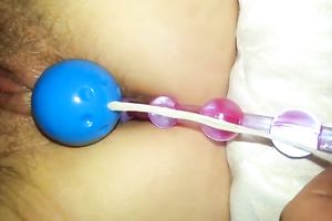Spoiled girlfriend of mine likes teasing her unshaved holes with some toys