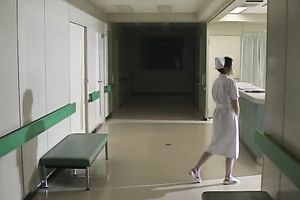 Gorgeous Japanese nurse exposes her bumpers and furry cookie