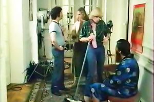 Raunchy looking skank lets her mustached paramour spoon her