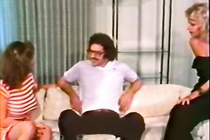 Two classic white women on the bed sharing one schlong