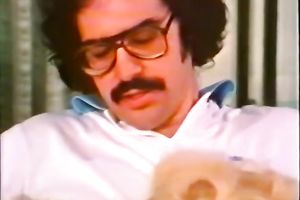 Two classic white women on the bed sharing one schlong