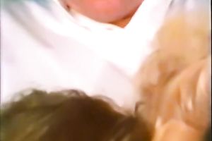 Two classic white women on the bed sharing one schlong