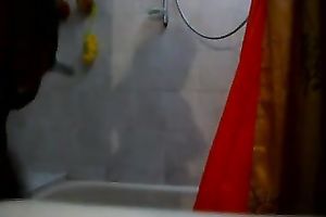 Chubby black skinned girl of my neighbour was taking a sexy shower