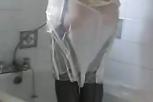 My small and cute aged wife in the washroom getting stripped