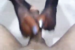 Lovely dilettante footjob from Indian slutty wife in fishnet nylons