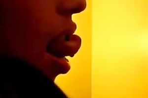 Delightful bronze skin girlfriend shows off her tongue