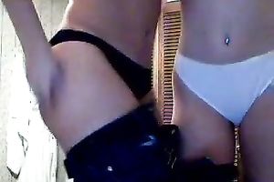 Two alike looking happily giggling angels kinda striptease for me on web camera