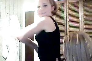 Two alike looking happily giggling angels kinda striptease for me on web camera