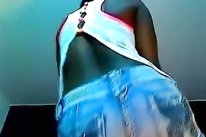 Curvaceous ebon queen stripteases on web camera and masturbates