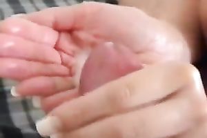 Girlfriend takes my load in her hand after a handjob and licks it