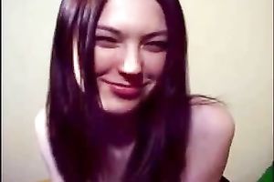 Russian redhead sexpot fingers her cooch on web camera