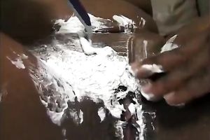 Saucy dark doxy receives cheerful to shave her cookie previous to fucking