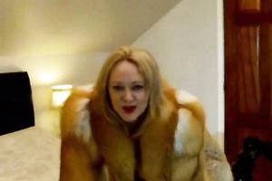 Blond haired harlot in fur coat stripped her actually large scoops and masturbated