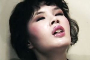 Unshapely asian wench masturbates for moustached cop