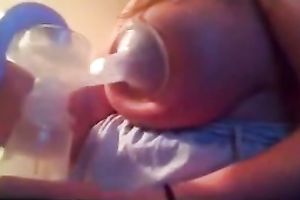 My cute BBC slut was pumping up some milk from her large juggs