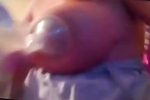 My cute BBC slut was pumping up some milk from her large juggs