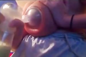 My cute BBC slut was pumping up some milk from her large juggs