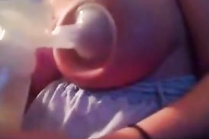My cute BBC slut was pumping up some milk from her large juggs
