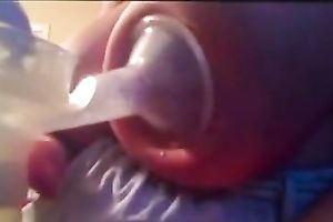 My cute BBC slut was pumping up some milk from her large juggs