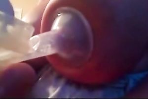 My cute BBC slut was pumping up some milk from her large juggs