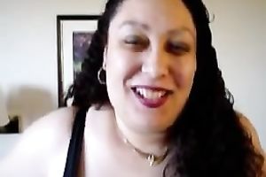 Mature mega breasty brunette hair girl shows off her juggs on home video