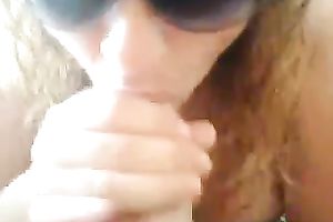 My impure curly haired floozy gives me head in hot sun shades