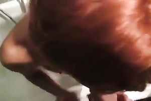 Red haired quite slender housewife with large boobs was engulfing my buddy in the baths