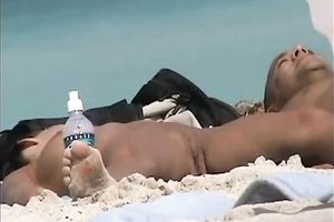 Beautiful dark brown youthful sweetheart on the beach feels nice