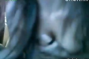 Naughty brunette hair cam doxy flashes her enjoyable titties