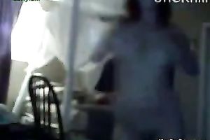 Naughty brunette hair cam doxy flashes her enjoyable titties