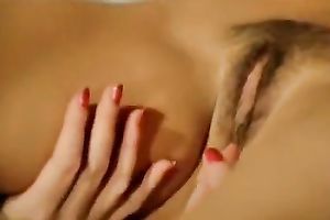 Well shaped hot women with ravishing Mamillas rest in ottoman and tempt every other