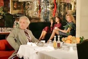 Well shaped hot women with ravishing Mamillas rest in ottoman and tempt every other