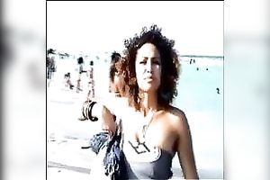 Spying on amazingly sexy ebon princess on the beach
