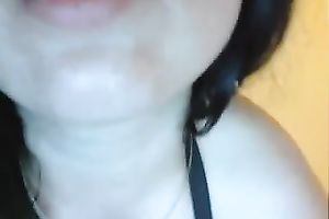 Stunning raven-haired beauty masturbates with white toy