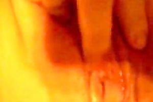 Wife strokes her sensitive clitoris making her snatch soak with love juice