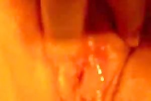 Wife strokes her sensitive clitoris making her snatch soak with love juice