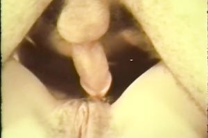 Deep penetration of big ramrod into soaked and taut vagina