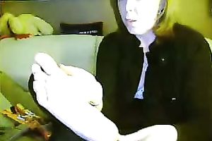 Mature UK web camera wife shows off her delightsome delicate soles