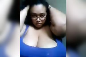 My ebon girlfriend in glasses is damn proud of her big zeppelins