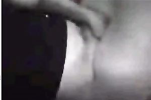 Black sweetheart rubs her fanny in bedroom throughout her pants