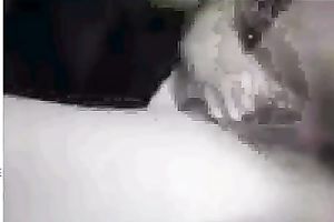 Black sweetheart rubs her fanny in bedroom throughout her pants