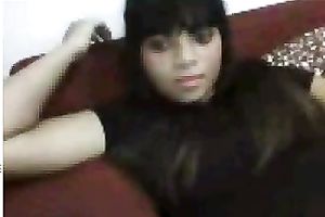 Black sweetheart rubs her fanny in bedroom throughout her pants