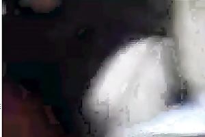 Black sweetheart rubs her fanny in bedroom throughout her pants