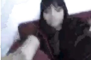 Black sweetheart rubs her fanny in bedroom throughout her pants