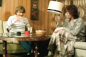 Redhead classic German playgirl giving head on the ottoman